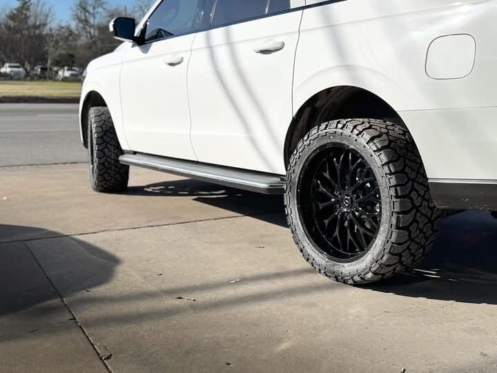 White SUV wheel and tire detail